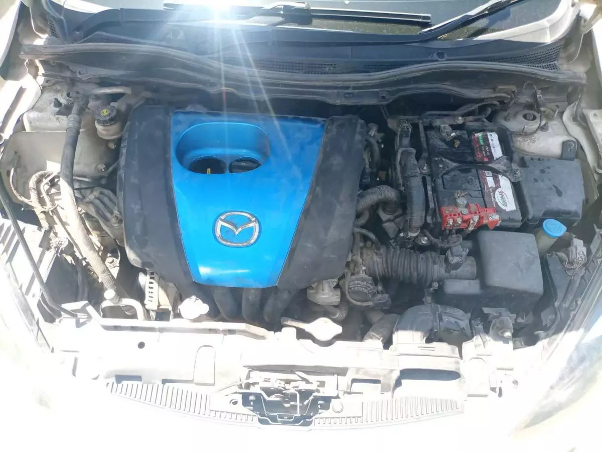 Mazda Demio   - 2012