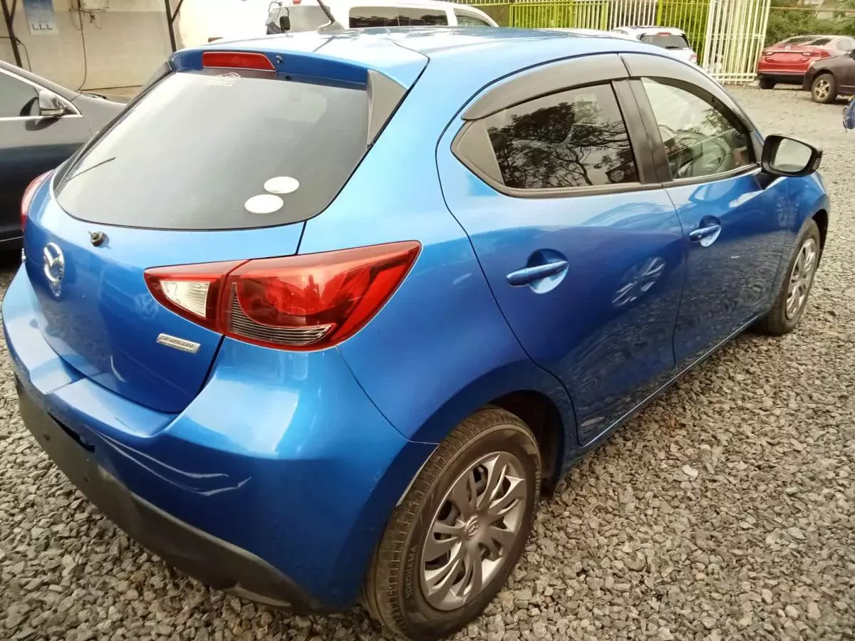 Mazda Demio   - 2015