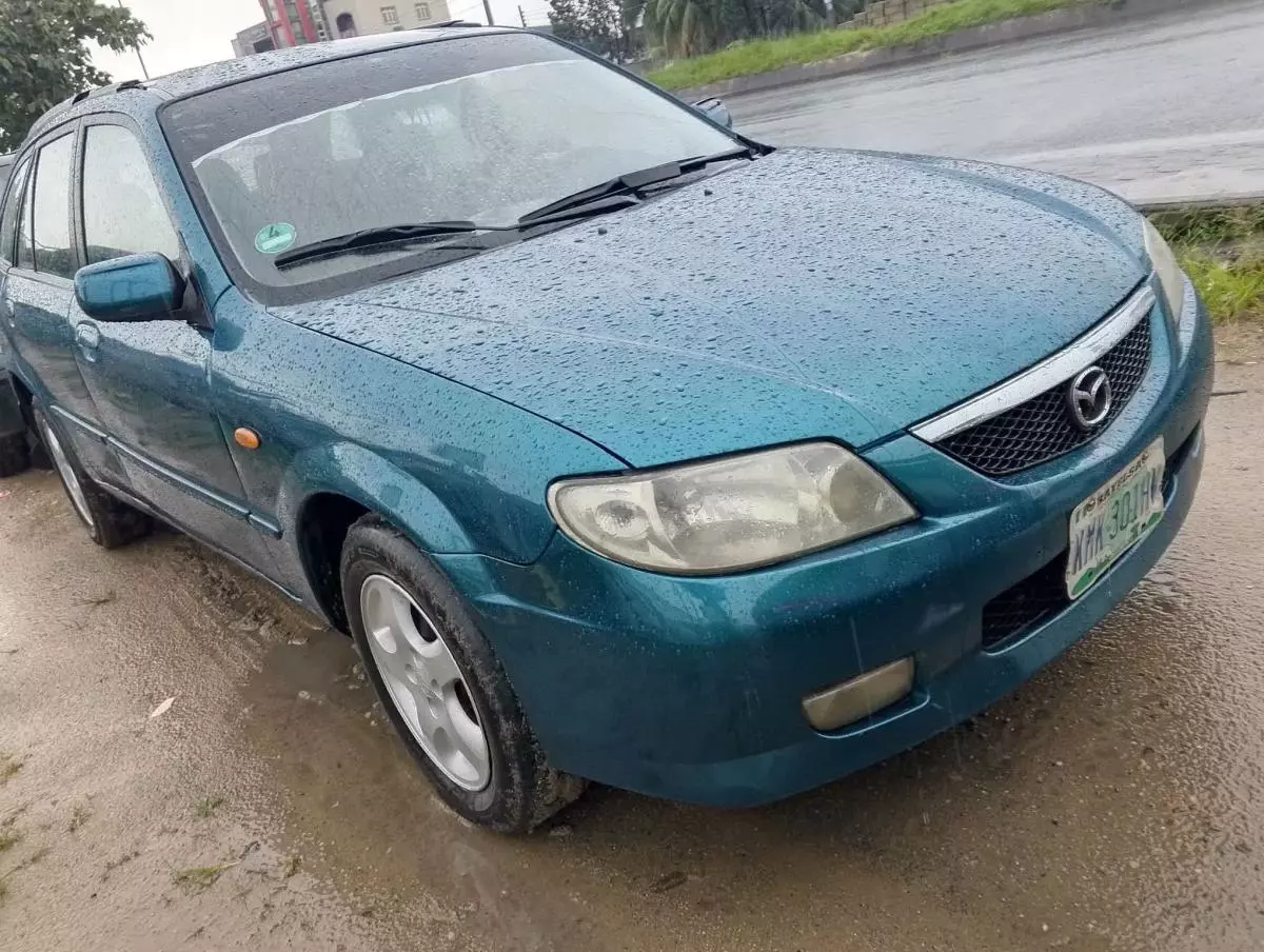 Mazda 323   - 20000