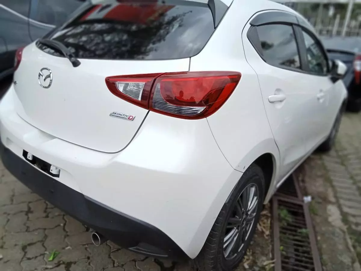 Mazda Demio   - 2016