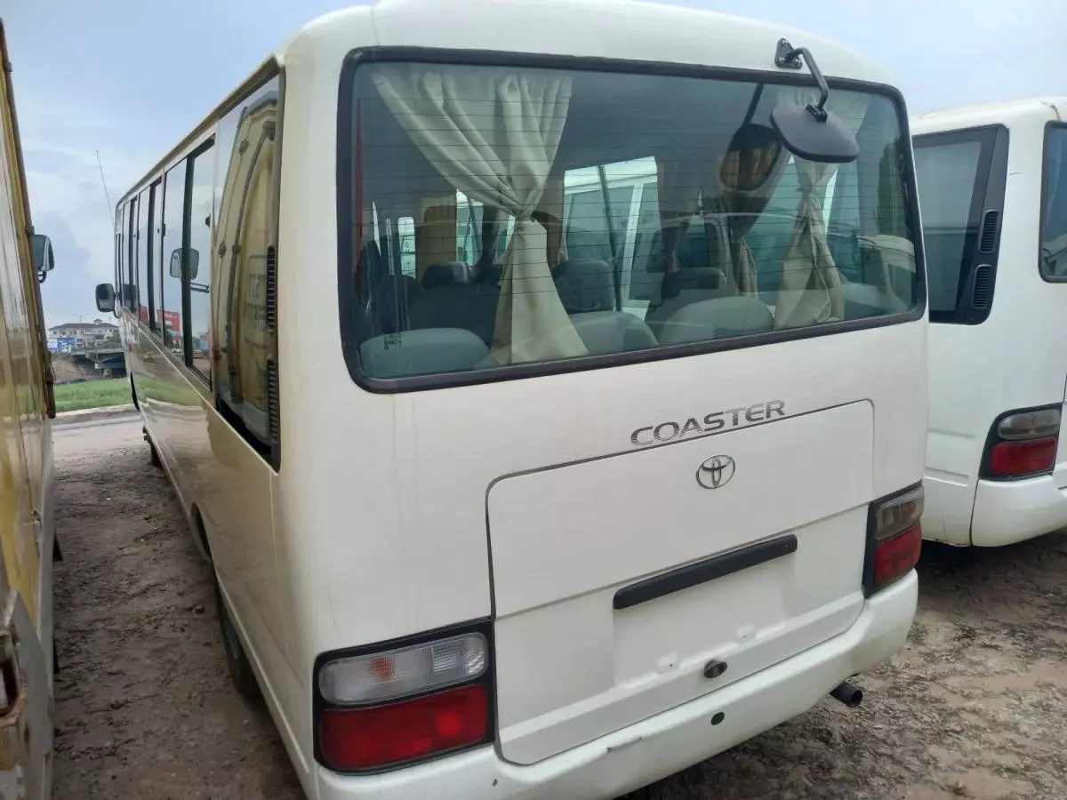 Toyota Coaster   - 2013