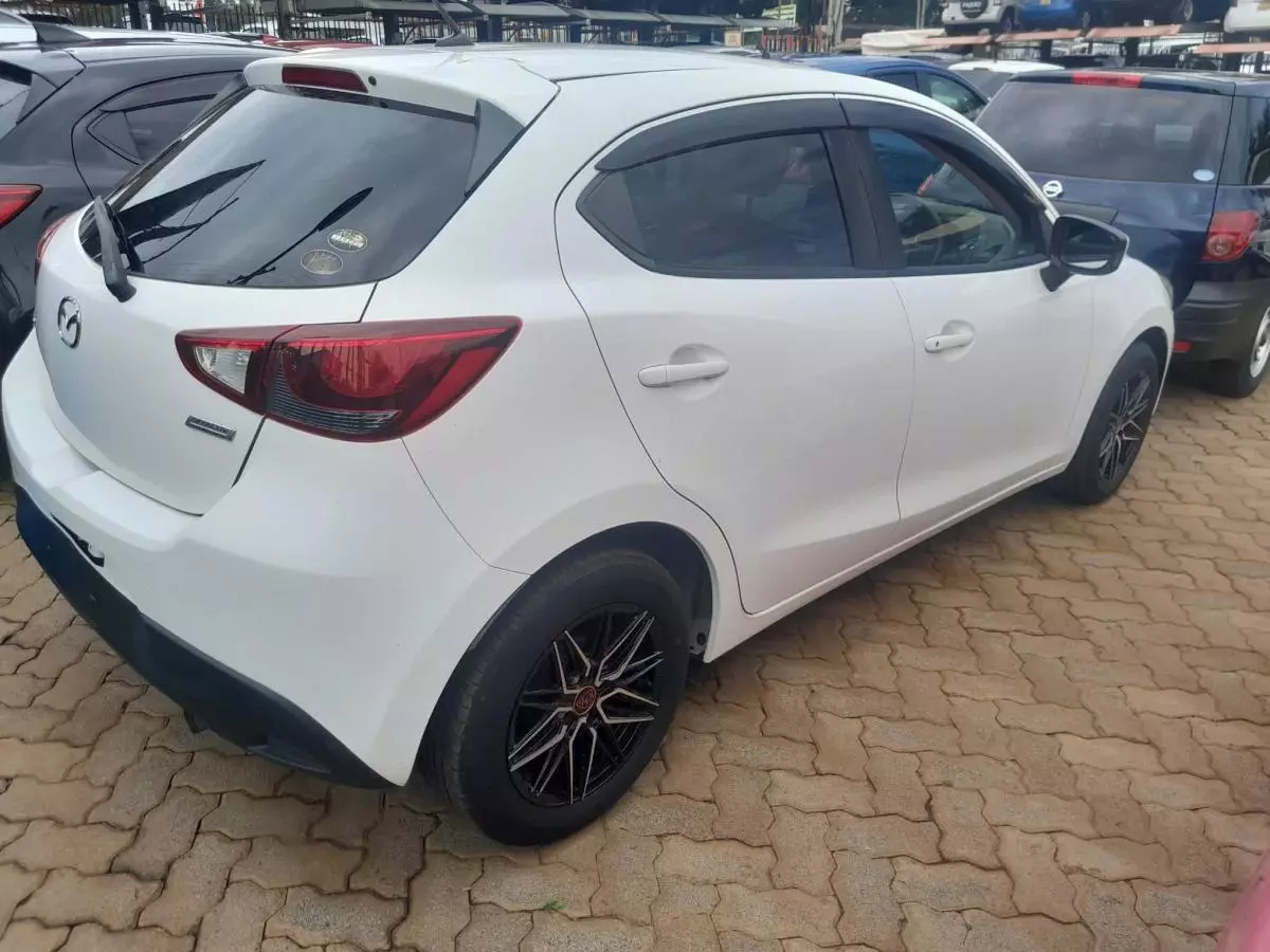 Mazda Demio   - 2016