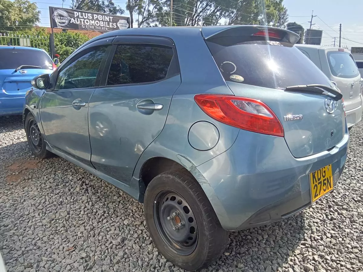 Mazda Demio   - 2014