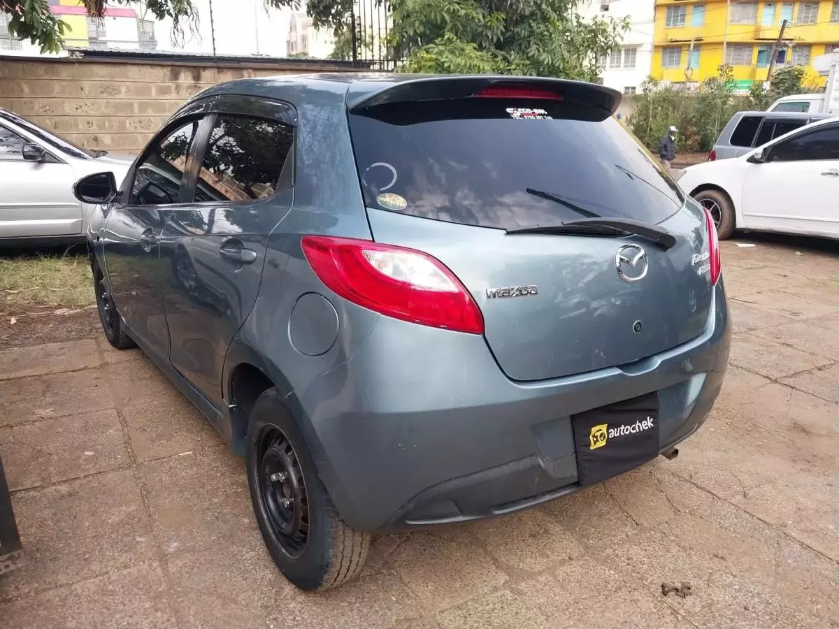 Mazda Demio   - 2014