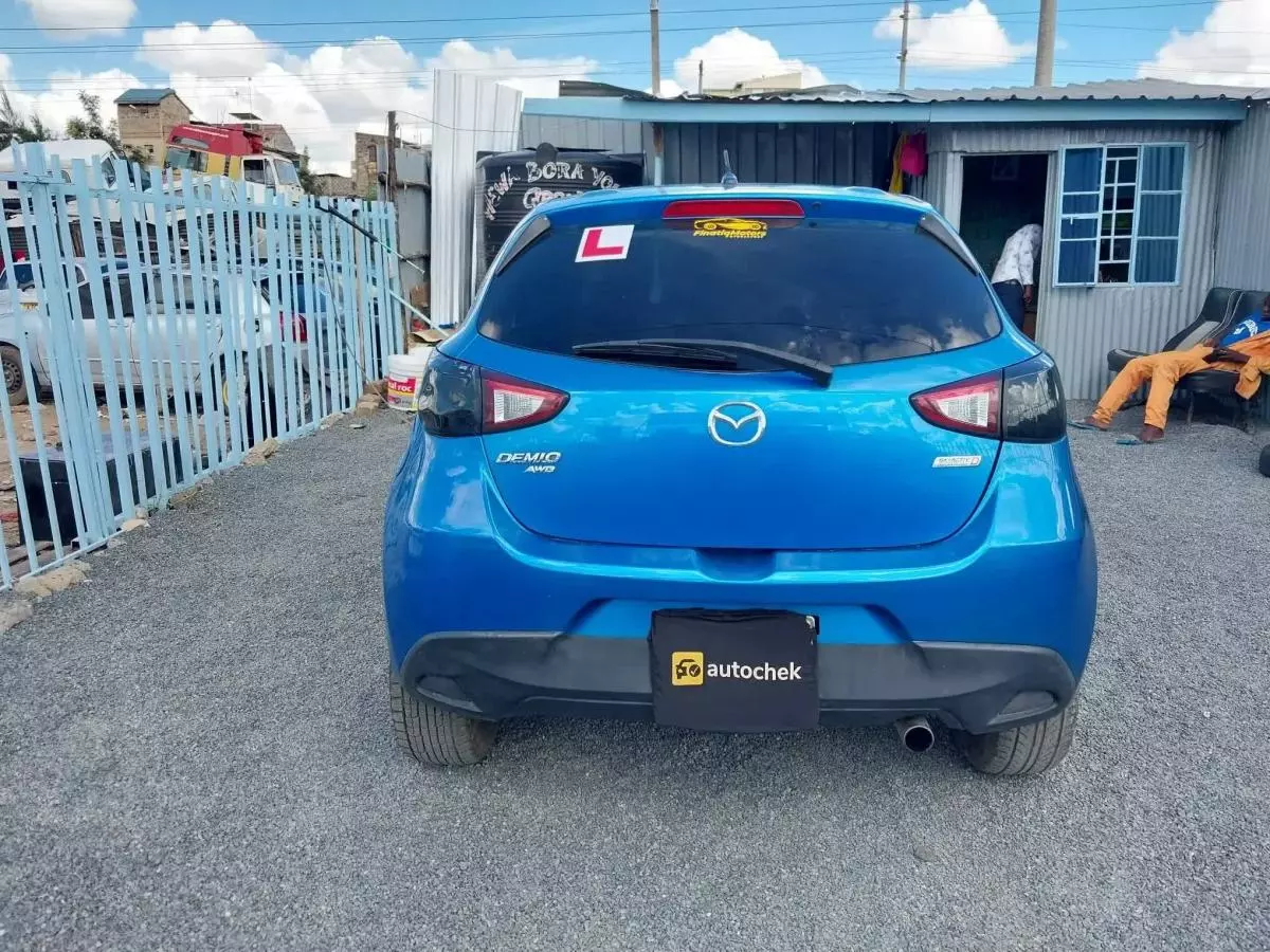 Mazda Demio   - 2015