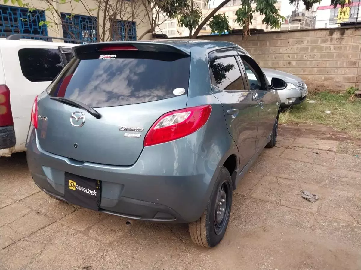 Mazda Demio   - 2014