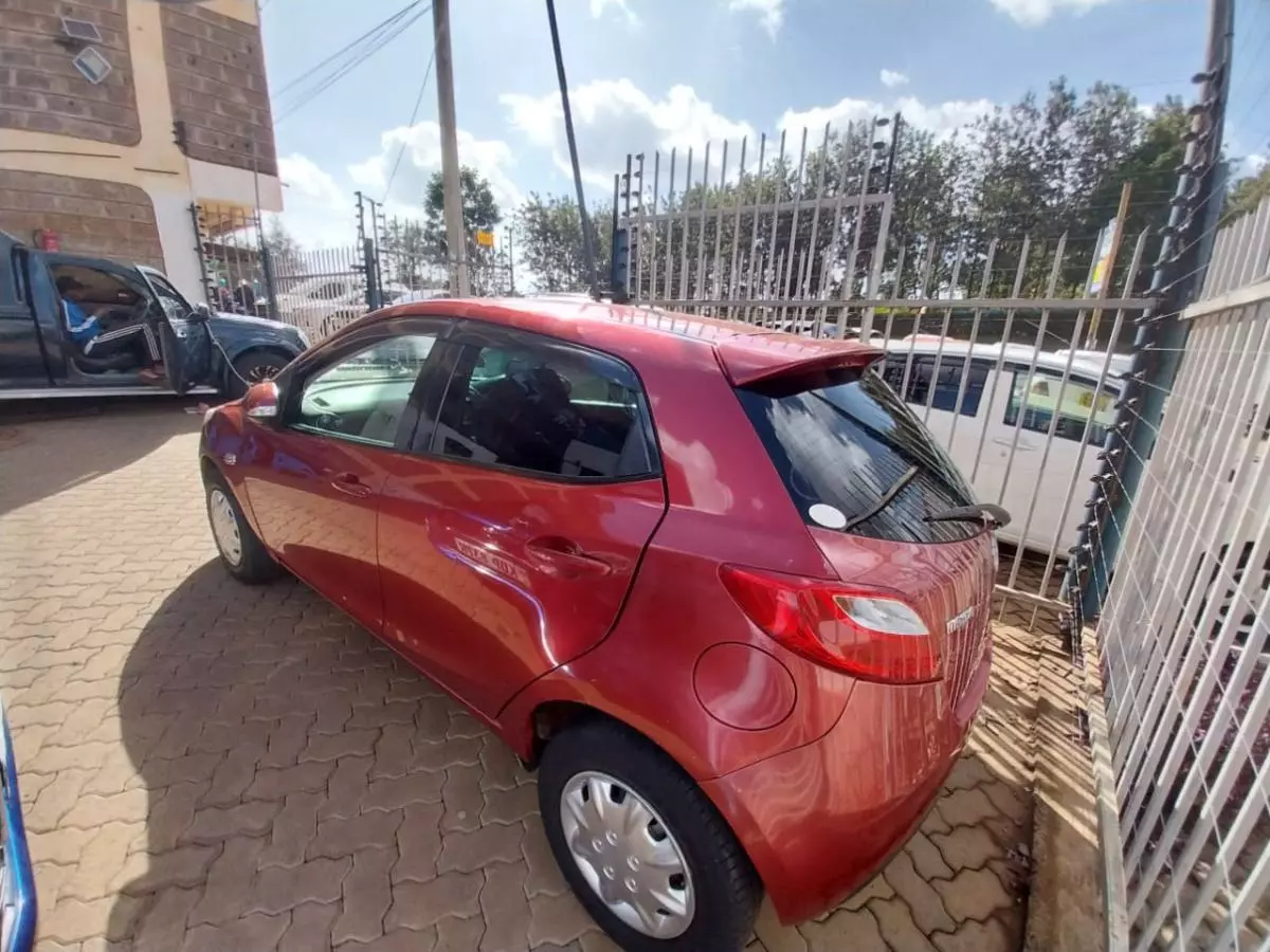 Mazda Demio   - 2014