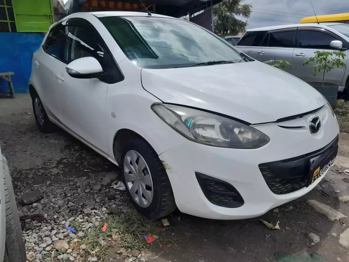 Mazda Demio   - 2013