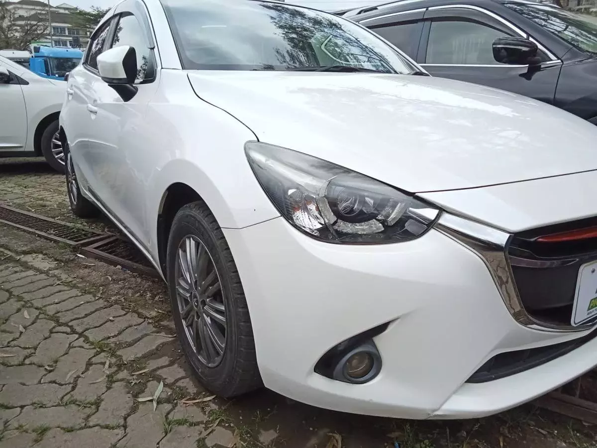 Mazda Demio   - 2016