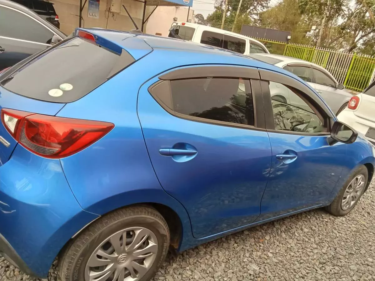 Mazda Demio   - 2015