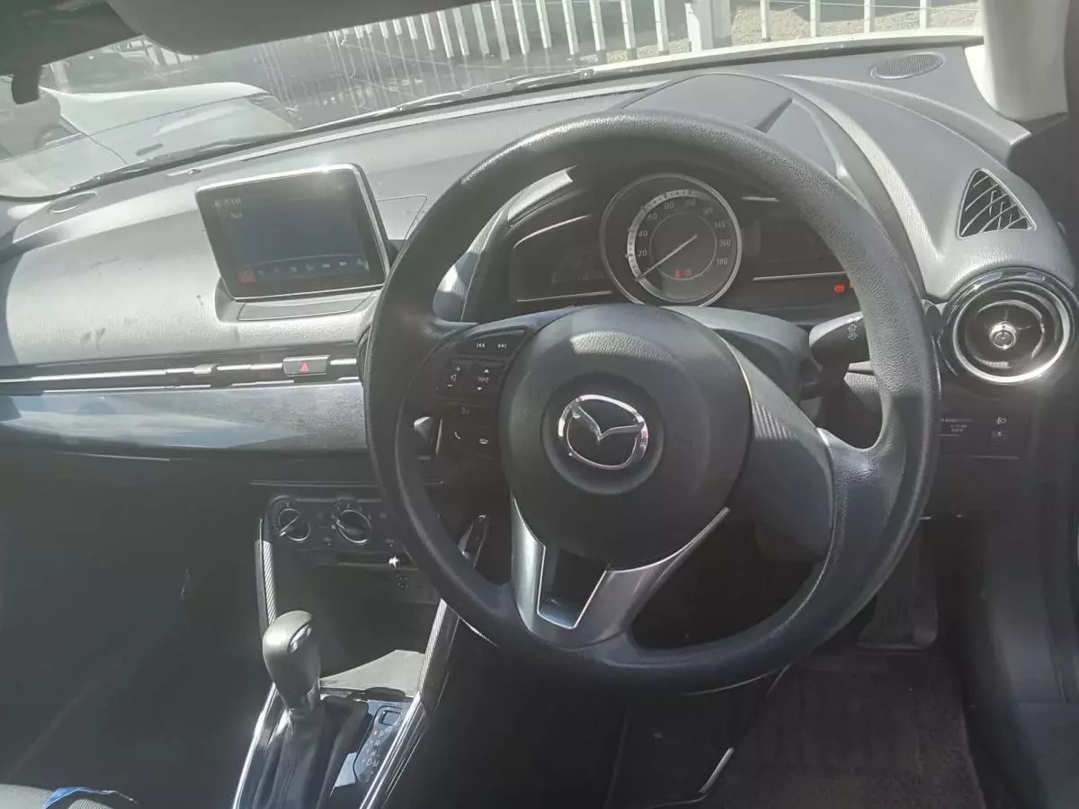 Mazda Demio   - 2015