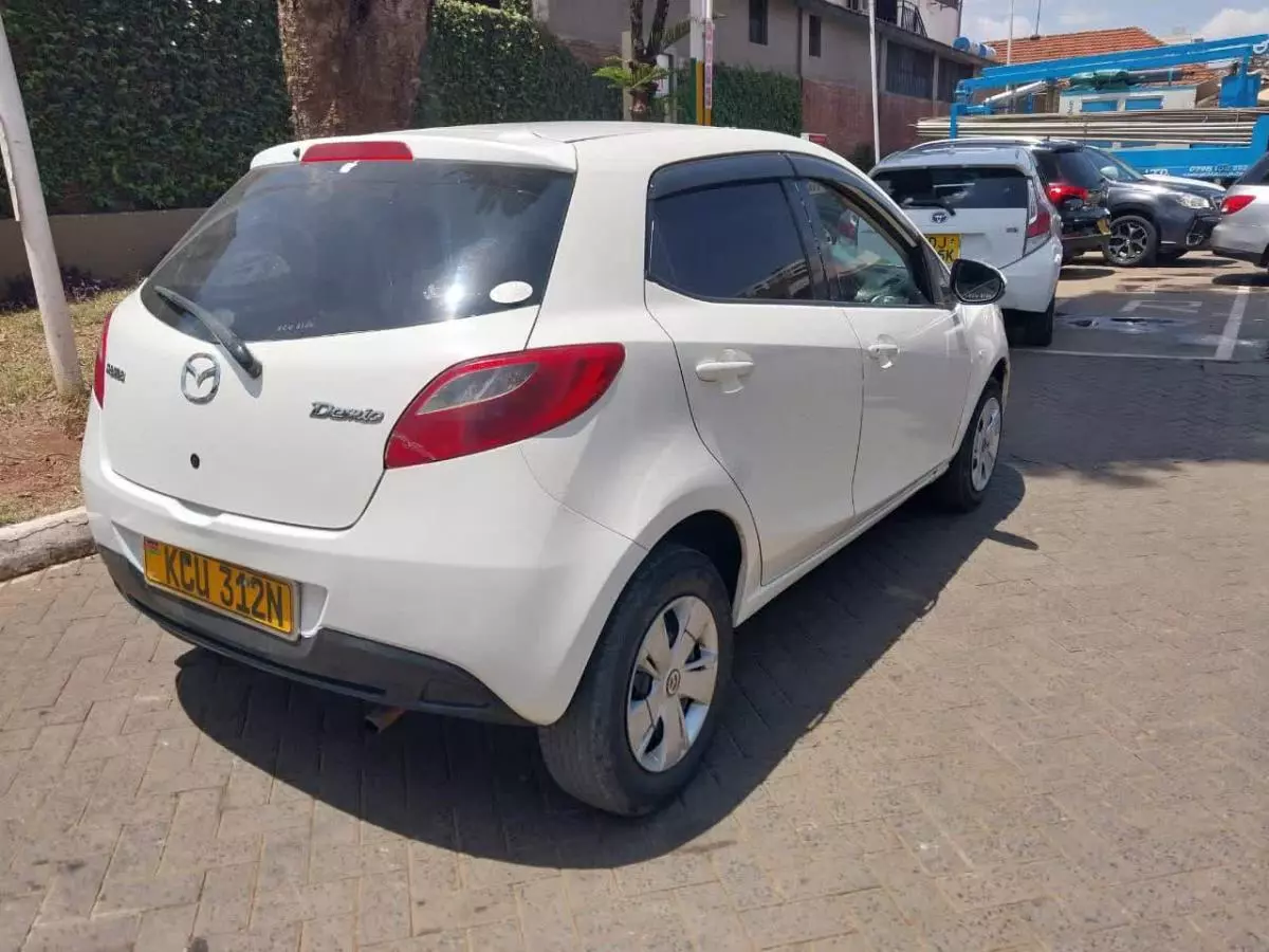 Mazda Demio   - 2012