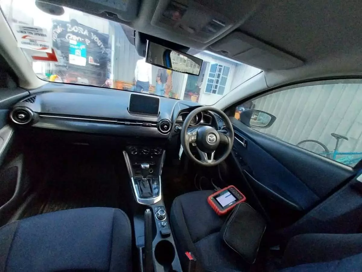 Mazda Demio   - 2015
