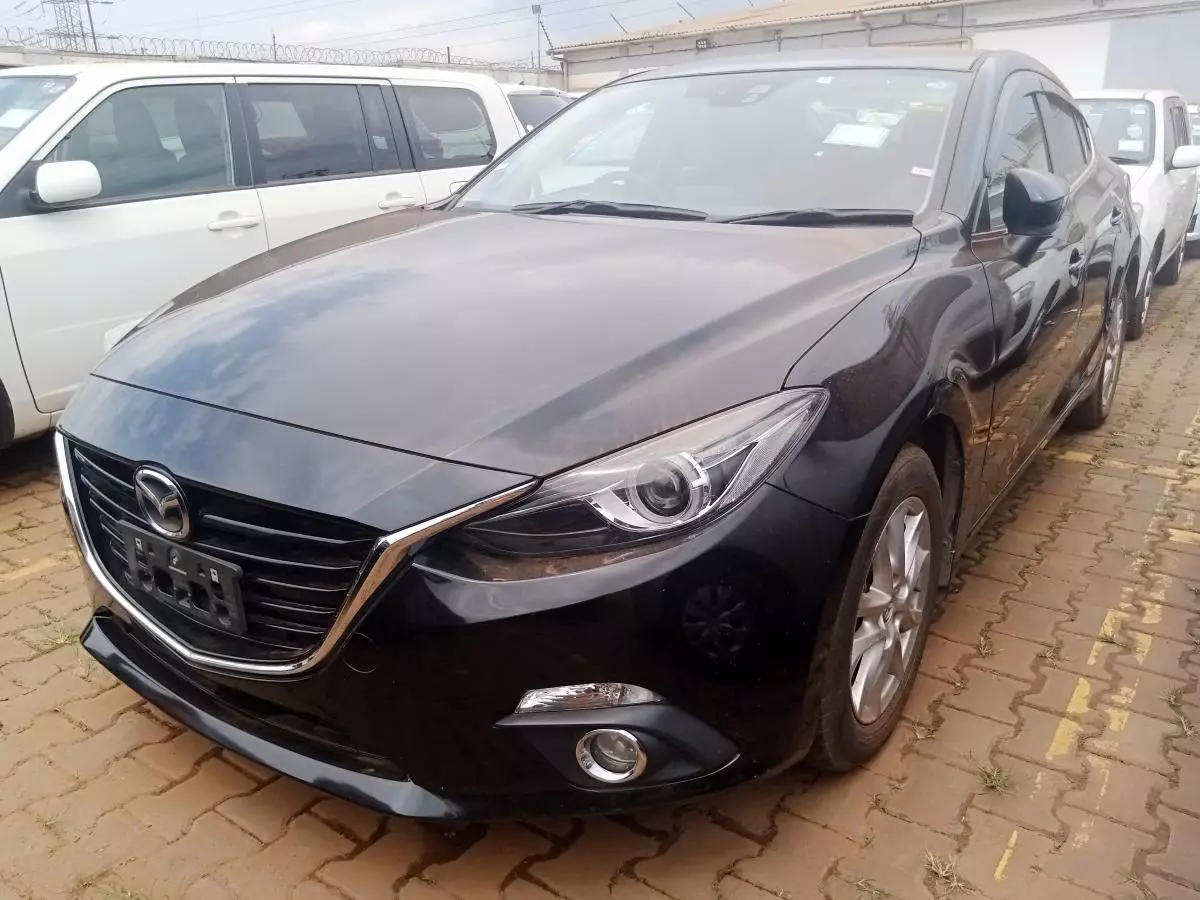 Mazda Axela    - 2015