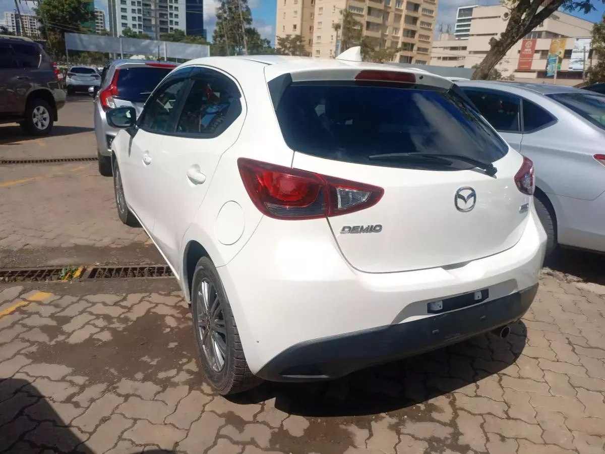 Mazda Demio   - 2016