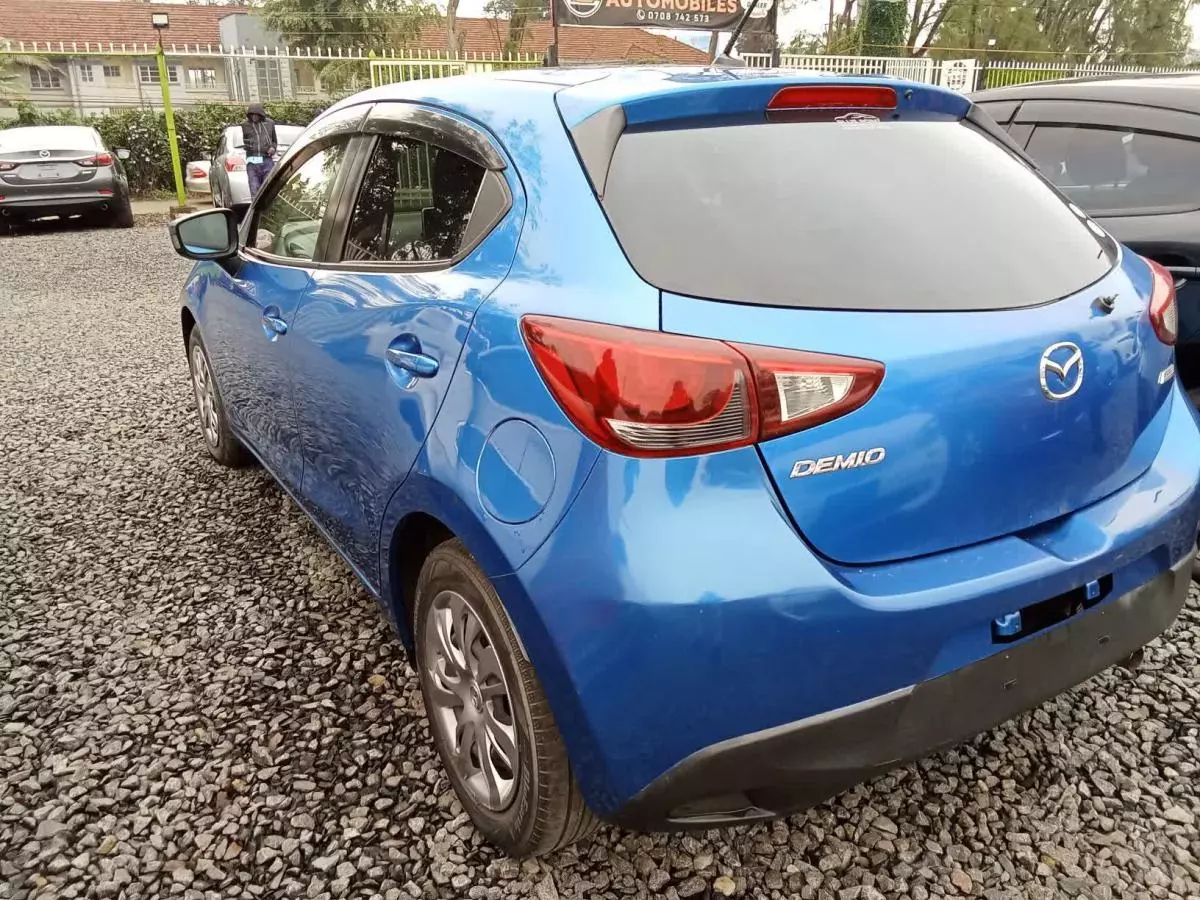 Mazda Demio   - 2015