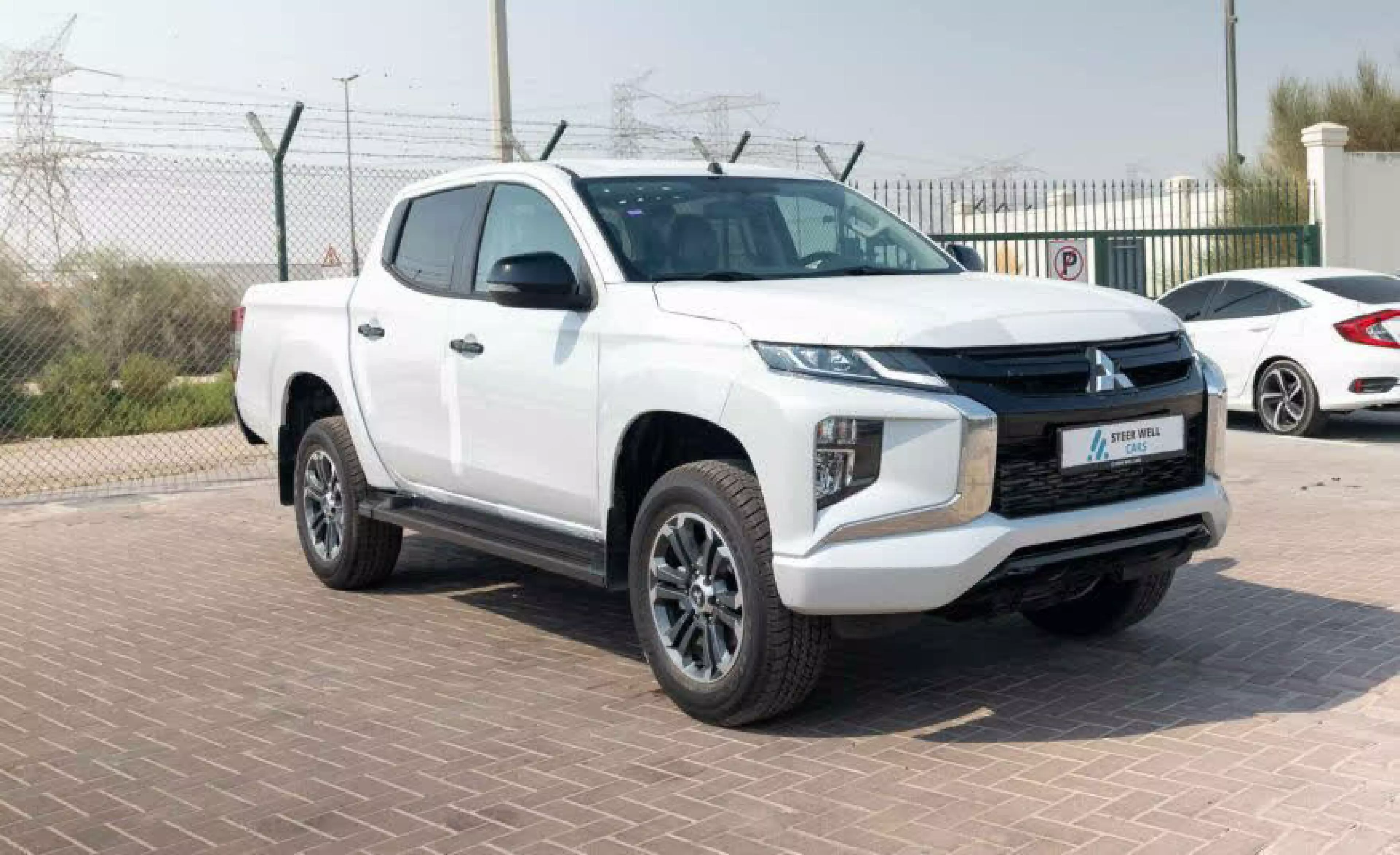 Mitsubishi L200 D/C GL Petrol  - 2024