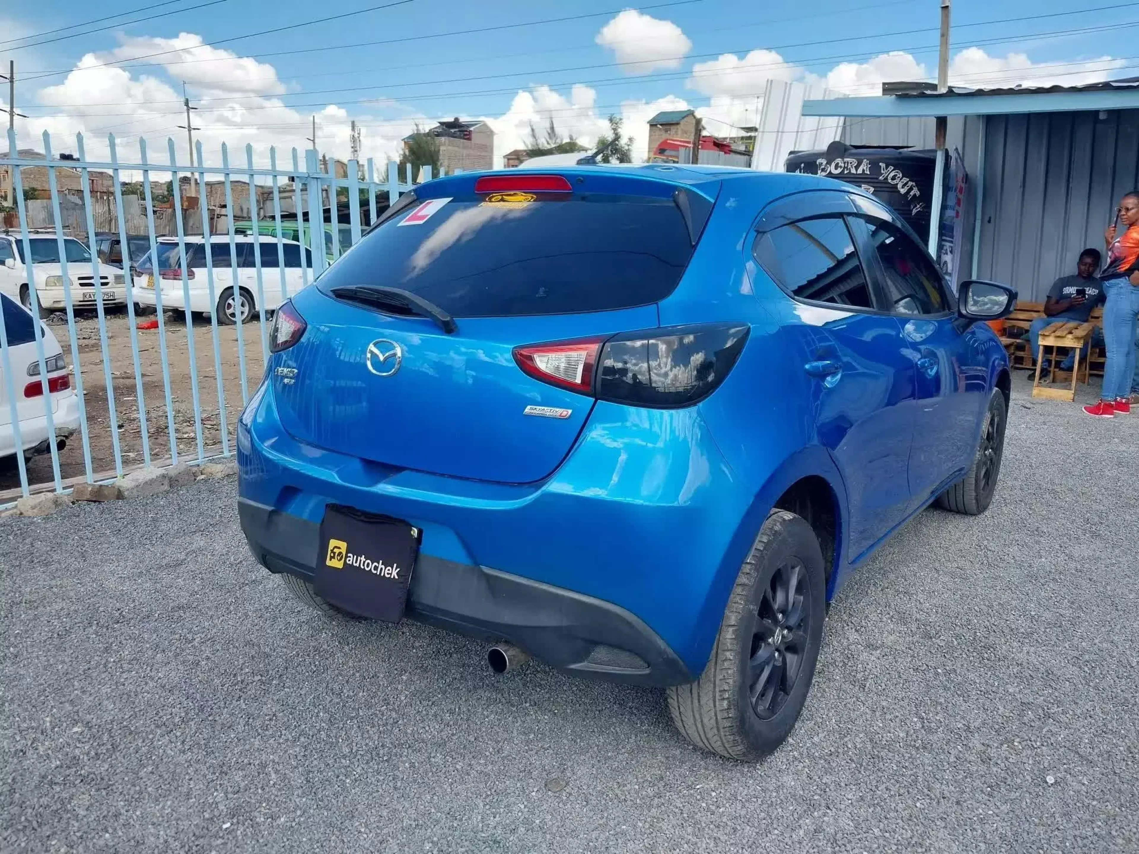 Mazda Demio   - 2015