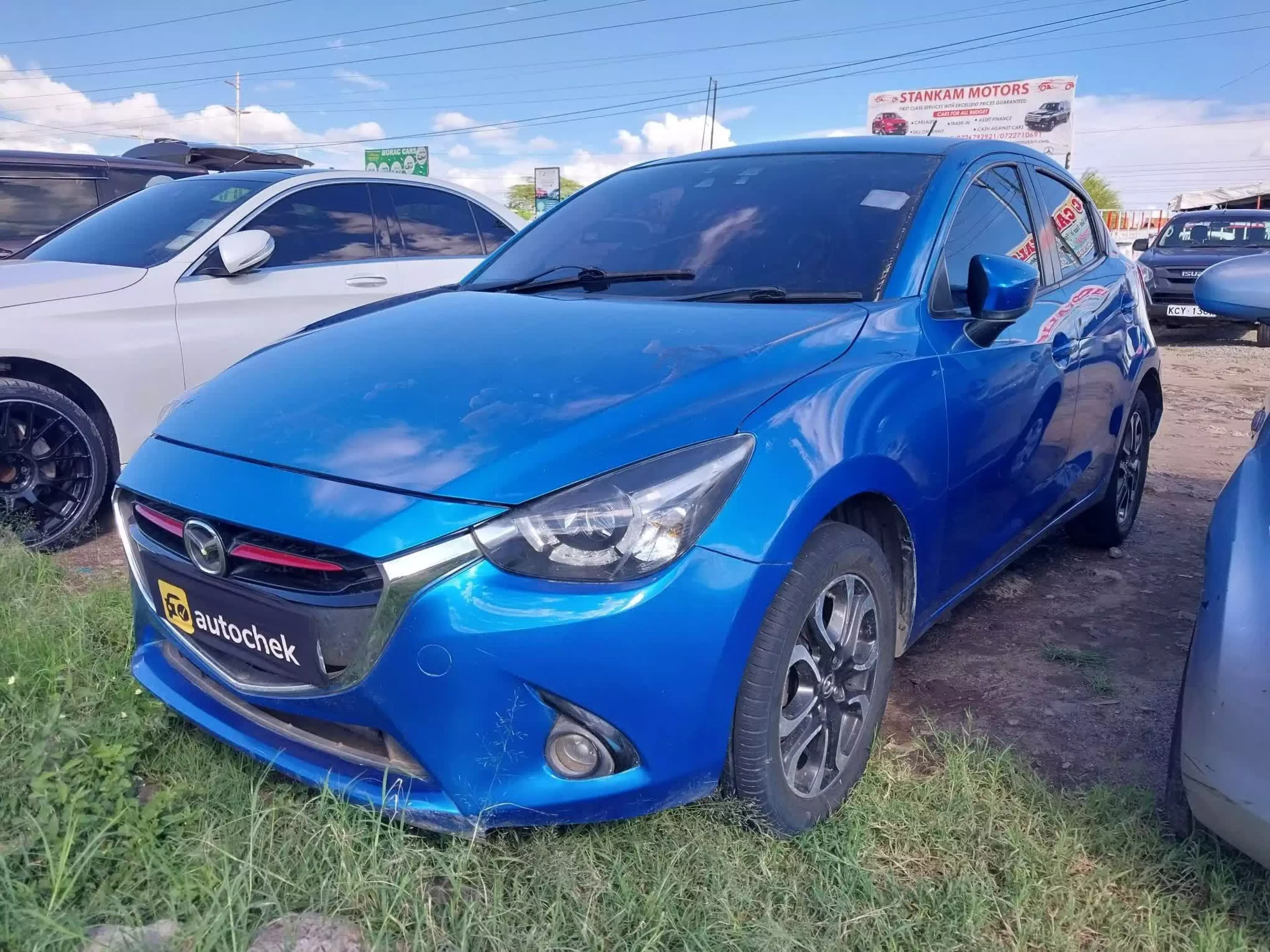 Mazda Demio   - 2015