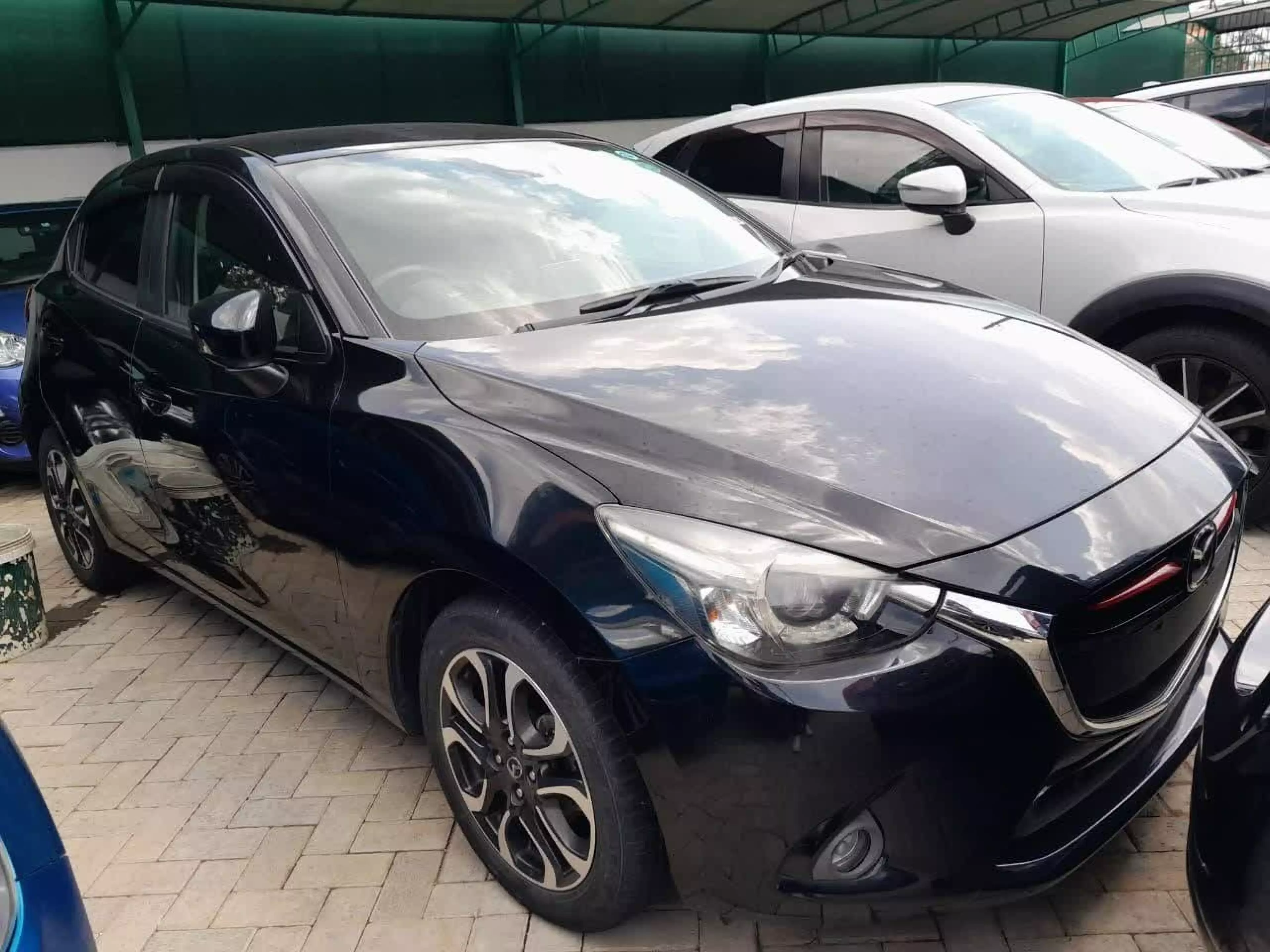 Mazda Demio  - 2016