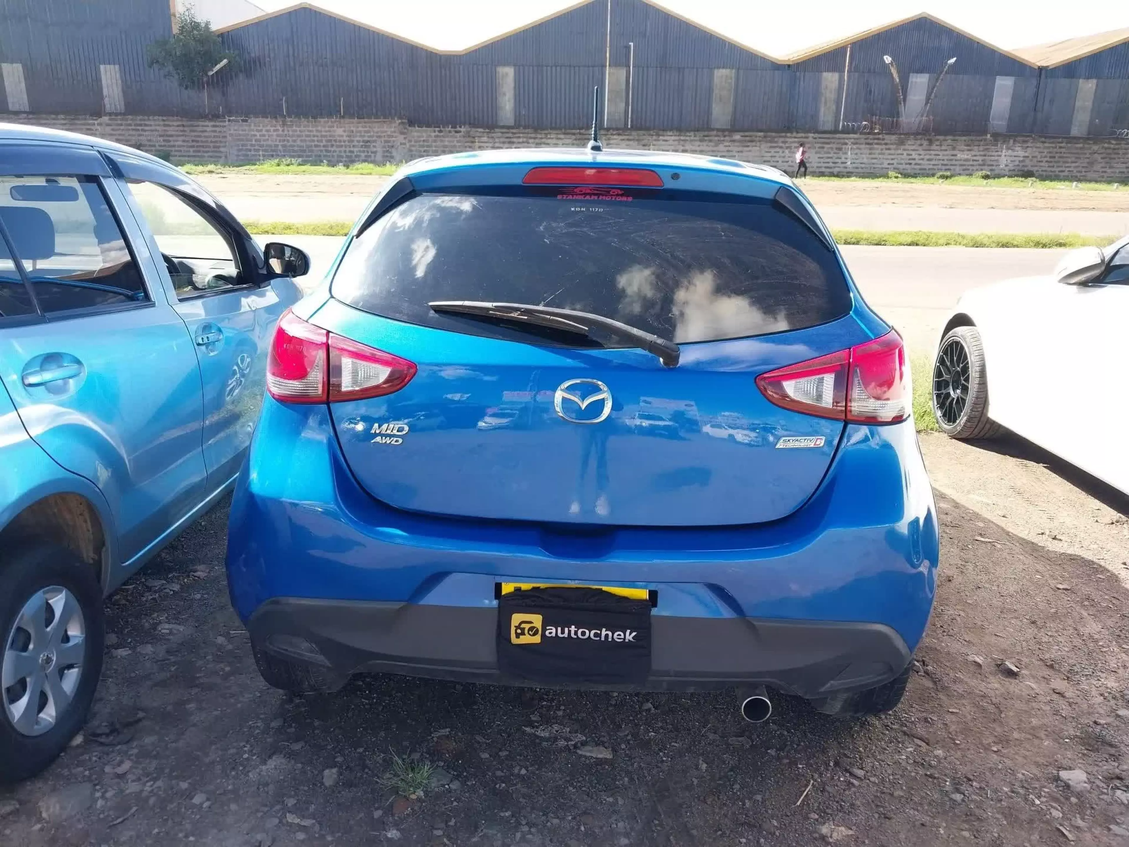 Mazda Demio   - 2015