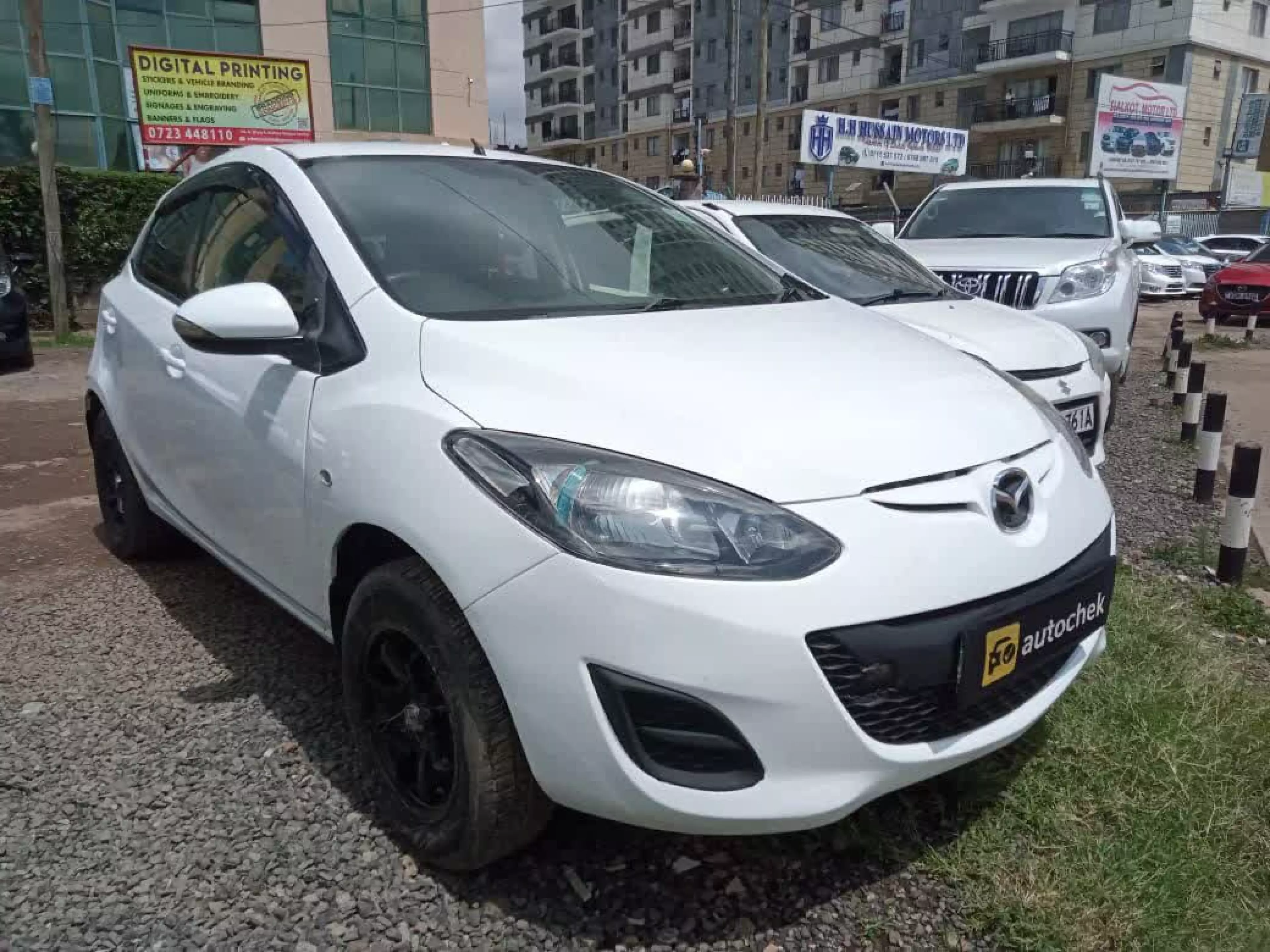 Mazda Demio  - 2013