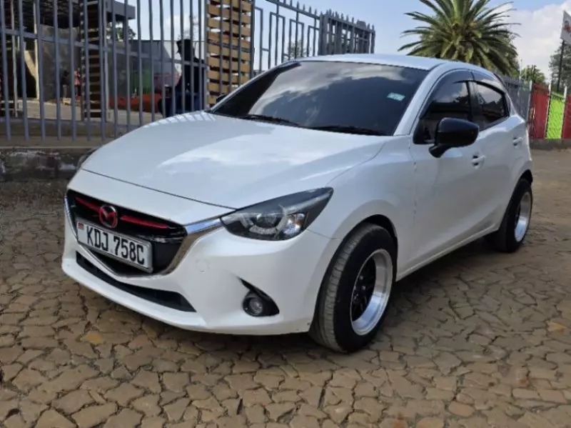 Mazda Demio   - 2015