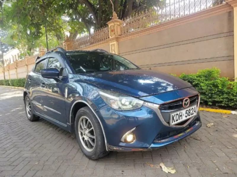 Mazda Demio   - 2015