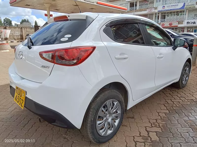 Mazda Demio   - 2015