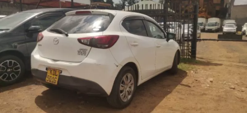 Mazda Demio   - 2015