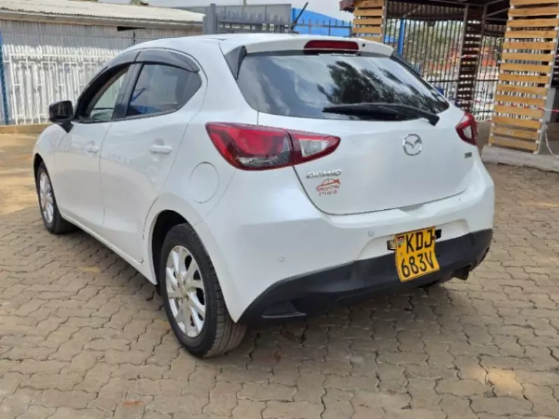 Mazda Demio   - 2015