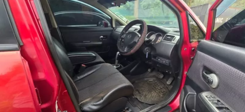 Nissan Tiida   - 2013