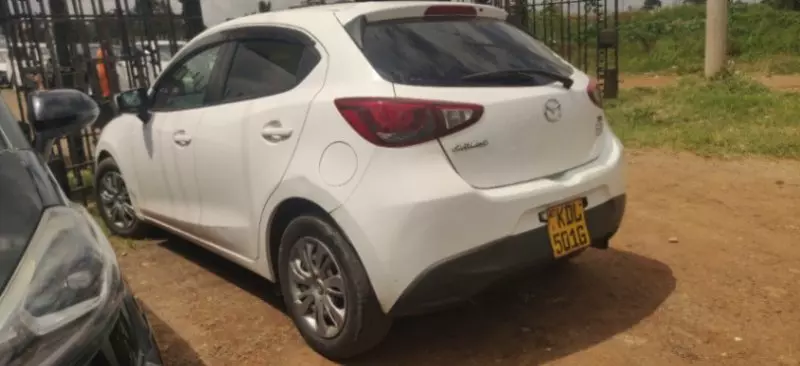 Mazda Demio   - 2015