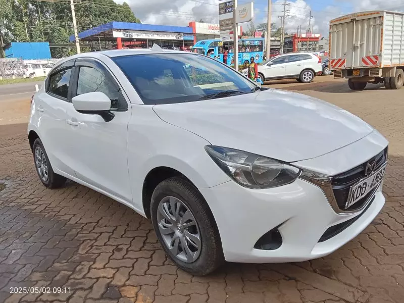 Mazda Demio   - 2015