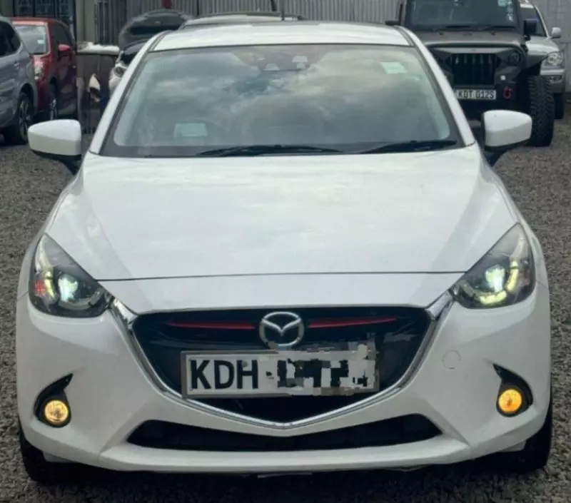Mazda Demio   - 2015