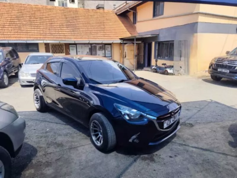 Mazda Demio   - 2015