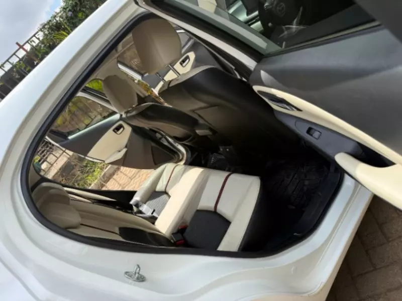 Mazda Demio   - 2015