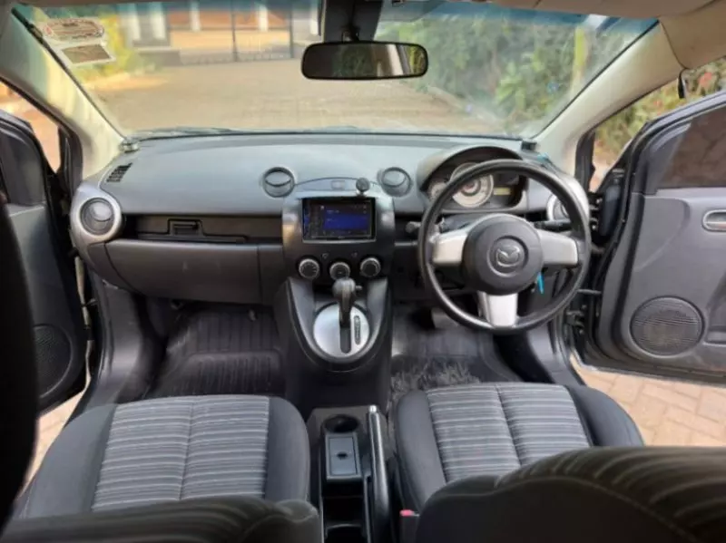 Mazda Demio    - 2009