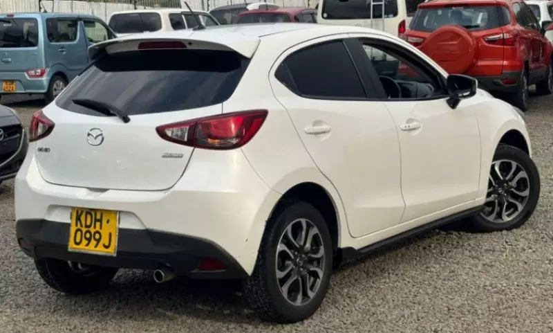 Mazda Demio   - 2015