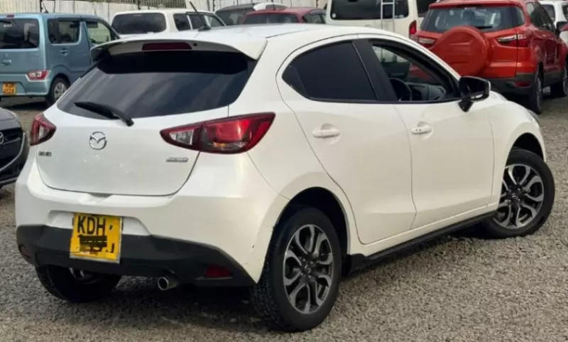 Mazda Demio   - 2015