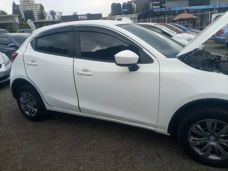 Mazda Demio   - 2015