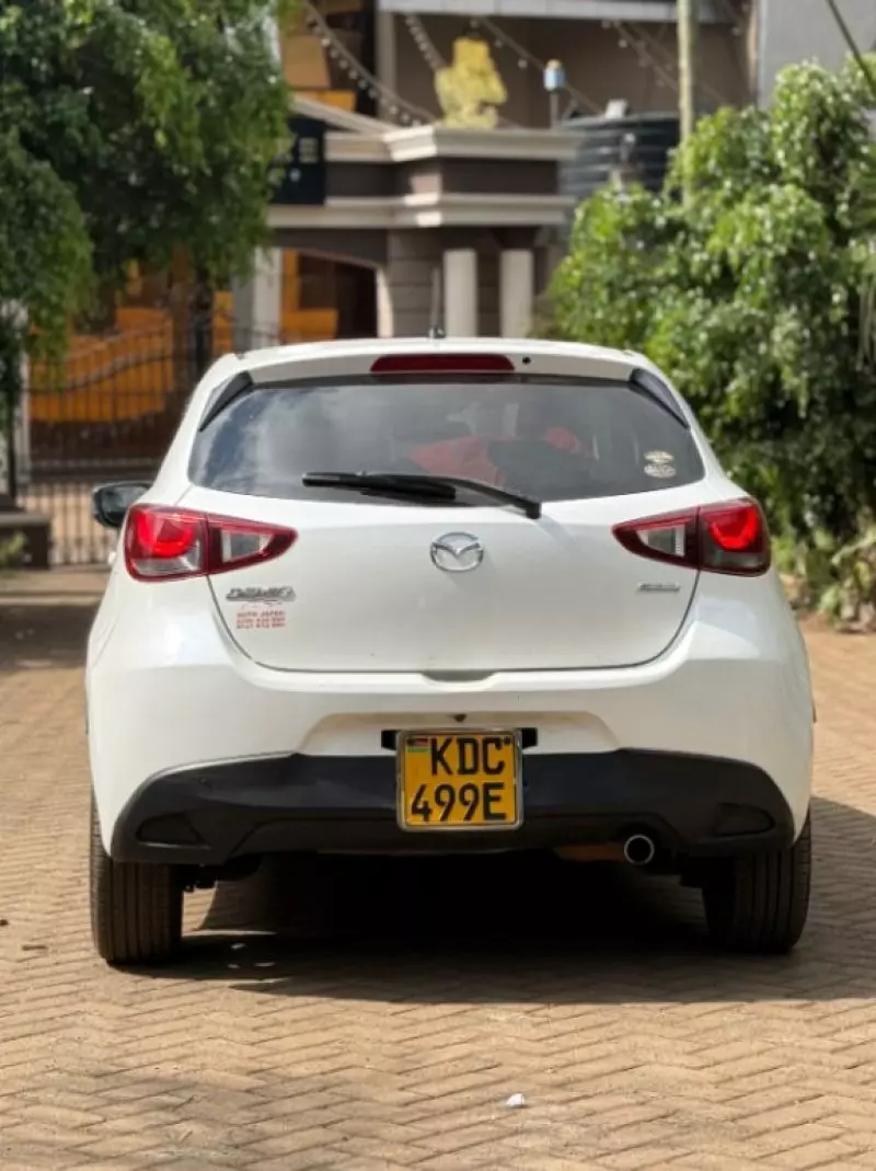 Mazda Demio   - 2015